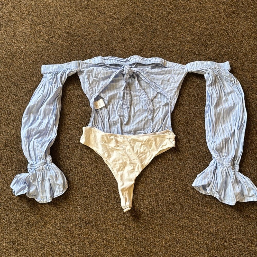 Blue and white body suit